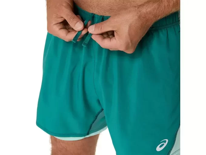 PANTALÓN CORTO ASICS PLATA 2N1 5IN