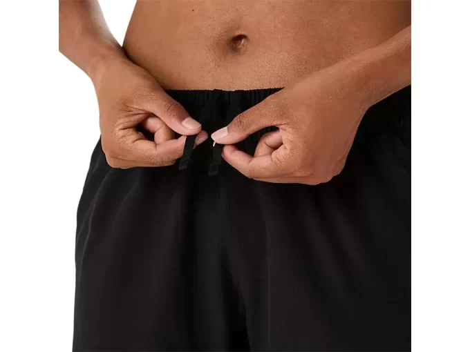 PANTALÓN TEJIDO PLATEADO ASICS