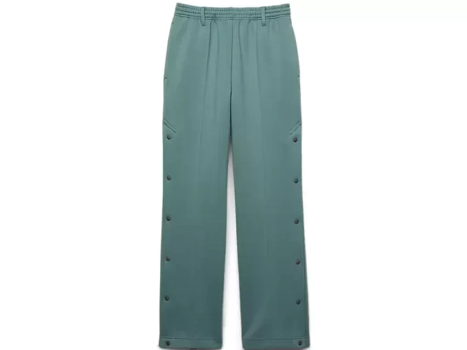 PANTALONES DE PUNTO CON BROCHES LATERALES